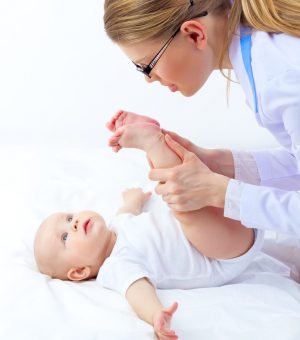 Friendly,Attractive,Woman,Doctor,In,Glasses,Hands,Massaging,Cute,Baby Friendly,Attractive,Woman,Doctor,In,Glasses,Hands,Massaging,Cute,Baby