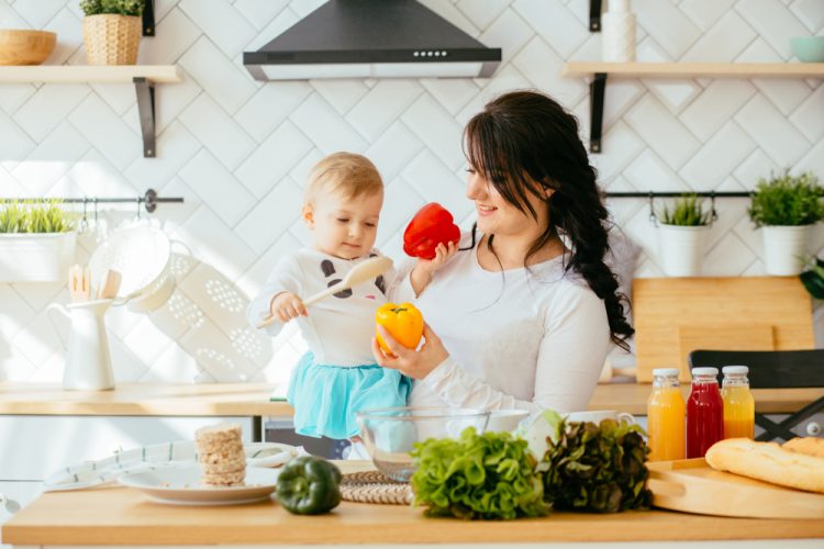 Kid,And,Mother,Cooking,Together.,Mother,Holding,Her,Little,Toddler Kid,And,Mother,Cooking,Together.,Mother,Holding,Her,Little,Toddler