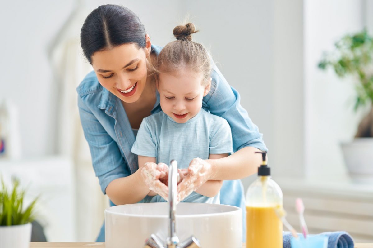 A,Cute,Little,Girl,And,Her,Mother,Are,Washing,Their