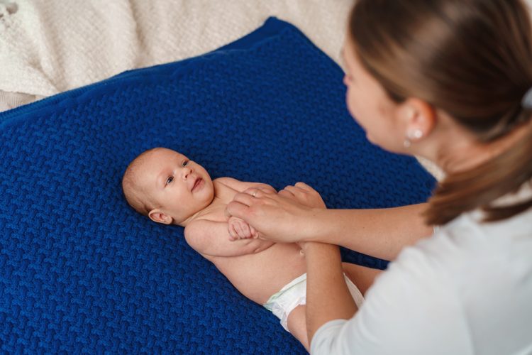 Gymnastics,Baby.,Woman,Plays,And,Doing,Exercises,With,Child,For