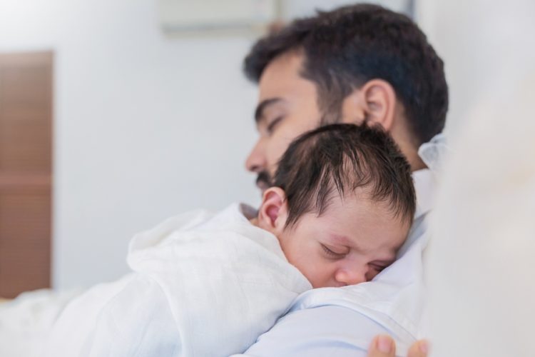 Closeup,Portrait,Of,Young,Asian,Indian,Father,Holding,His,Newborn Closeup,Portrait,Of,Young,Asian,Indian,Father,Holding,His,Newborn