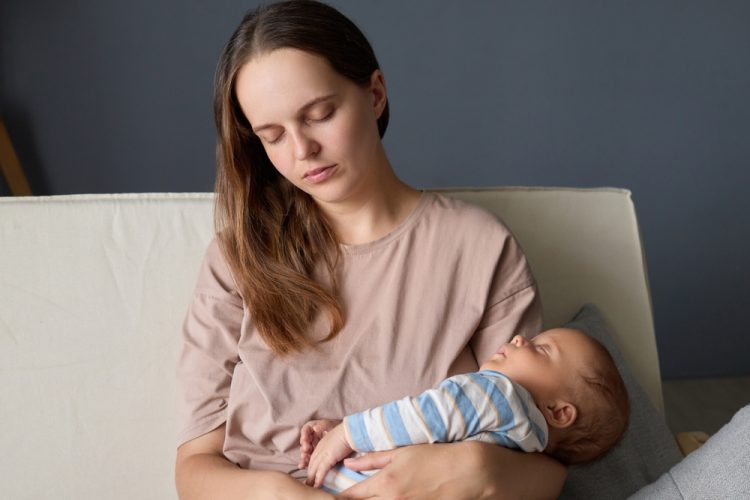 Tired,Mom,With,Her,Baby,Taking,A,Nap,To,Rest Tired,Mom,With,Her,Baby,Taking,A,Nap,To,Rest